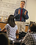 teacher talking to his students