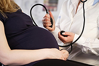 	pregnant woman and doctor