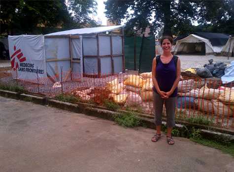Kelsey in front of Ebola Treatment Center.