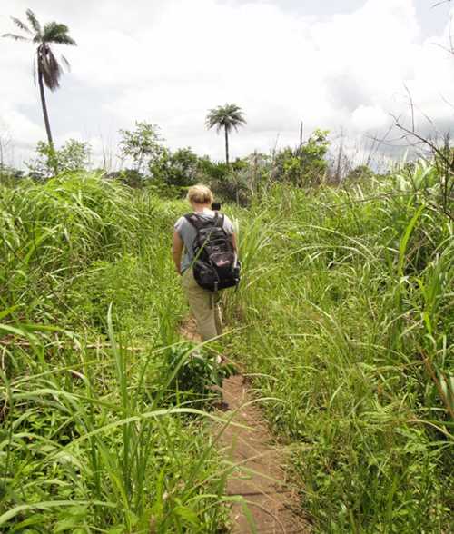 Photo: Dr. Kari is headed to a village to complete a day of contact tracing with the team.