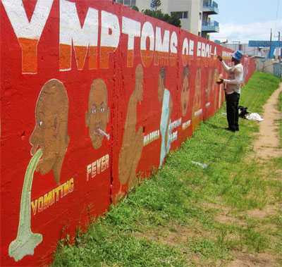Educational messages on Ebola are delivered in unique ways in Liberia. Here, a mural shows symptoms of Ebola.