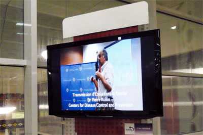 Ebola information in the Conakry, Guinea airport. This video features CDC Ebola expert, Dr. Pierre Rollin.