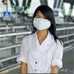 Photo: Health worker with a breathing  mask on