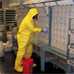 Photo: Worker in a hazard suit