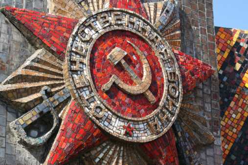 Soviet sigil featuring two stars, hammer and sickle