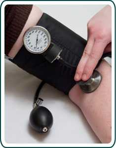 A man getting his blood pressure taken.