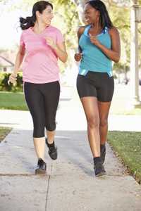 Photo of two women jogging