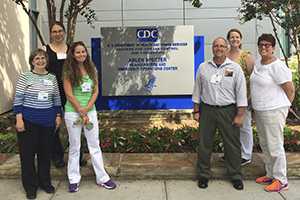 Science Ambassador group picture in front of CDC sign