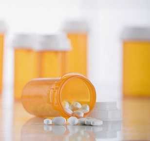 Pill bottls filled with medicine.