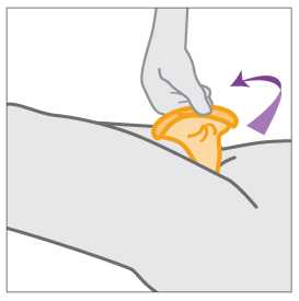 Hand removing female condom.