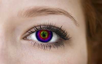 	a rainbow-colored contact lens for costuming.
