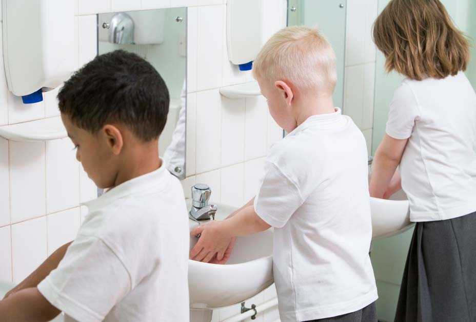 Children washing their hands