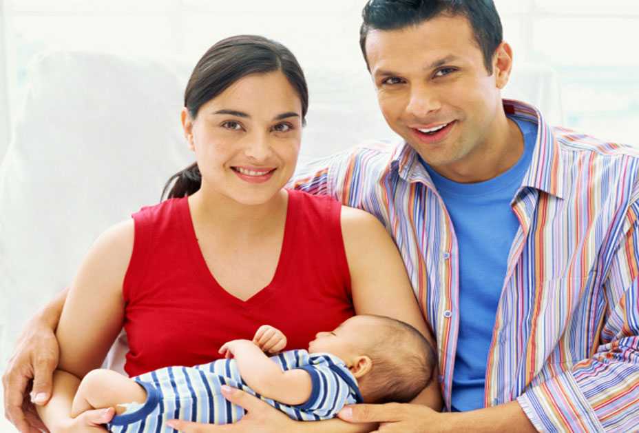 Young mother and father with baby