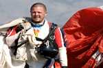 Josh in skydiving gear - Get Smart About Antibiotics: For Patients and Parents