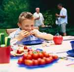 child eating healthy food