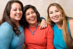 Latino mother with daughters