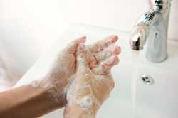 Someone washing hands