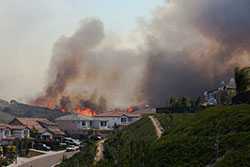 Wildfires burning near residential area