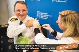 Dr. Jernigan receives the flu vaccine