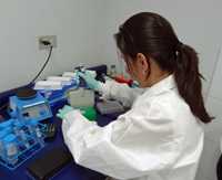 Guatemalan lady worker in a lab.