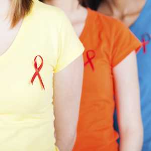 Women with HIV ribbon on shirt
