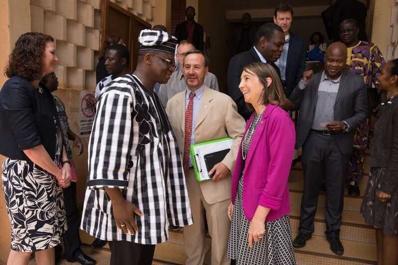 Rebecca Greco Kone (R), director of CDC’s office in Burkina Faso, seen here with Minister of Health Professor Nicolas Meda (center), has developed a strong and productive relationship with the country’s public health leaders and partner organizations. (Source: Evelyn Hockstein, CDC Foundation)