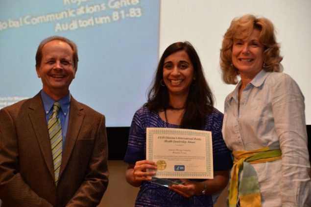Dr. Pratima Raghanthan (Center) receives the 2013 CGH Honor Award on behalf of CDC Rwanda. The award was presented by Dr. Thomas Kenyon (Left), the former Director of the Center for Global Health and Dr. Debbie Birx (Right), the former Director of the DGHA. 