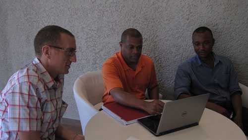 	George Fergeson (BBC Media Action SL Country Director), Patrick Minor, CDC Sierra Leone DART liaison, and Musa Sangarie,  Program Manager (BBC Media Action)