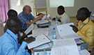 Dr. Eric Brenner CSTE senior epidemiologist consultant detailed to CDC's FETP-STEP training in Cote d'Ivoire, working through disease surveillance exercises with course participants to practice all the components of managing their surveillance data - Yamoussoukro, Cote d’Ivoire January 13, 2015