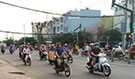 Motorcyclists on a busy street in Ho Chi Minh City.