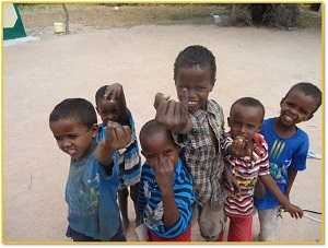 Children in Dadaab Town in North Eastern Kenya show their marked fingers after being vaccinated against polio during the in-process monitoring following the wild type poliovirus outbreak in May 2013.  Nyeri , Kenya, 