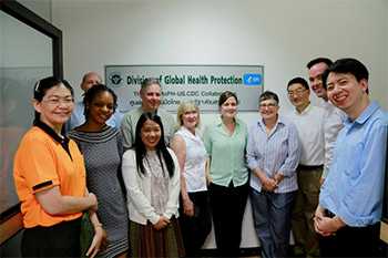 The Director of the Strengthening Laboratory Capacity Program at CDC’s Global Disease Detection Center in Thailand, Dr. Toni Whistler (pictured above, fourth from the right, with the Thailand lab staff), gives a “hats off” to a dedicated group of locally employed laboratorians who took the initiative to make this project happen.