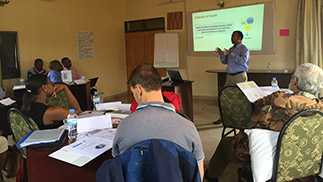 Jami Husain from CDC's Global NCD team delivers the NCD program manager course to the Rwanda IHDPC NCD Division.