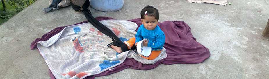 	Image of a baby in Pakistan during a September 2013 FETP public health action 