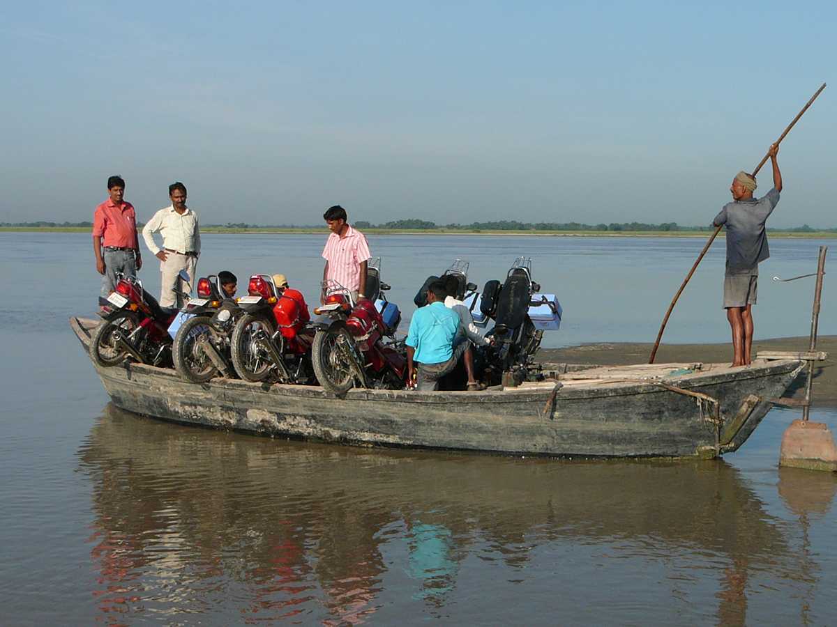 The massive size of India alone poses a challenge to vaccination teams. As seen here, vaccinators have to use motorcycles to travel between communities, but, first, they travel across a large body of water to get to the areas where other communities exist.