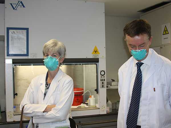 Dr. Nancy Knight, accompanies Dr. Thomas Warne, on a tour of the TB testing and treatment facilities at eThekwini CAPRISA Research Clinic on Tuesday, June 2, 2014, in Durban, KwaZulu-Natal.
