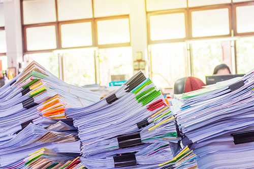 	Big stacks of paperwork