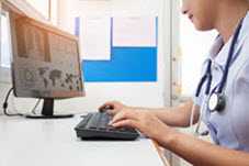 Healthcare worker using a computer