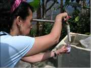 	A specialist checking the tap water in a community system