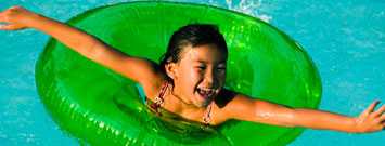 A girl in a swimming pool.