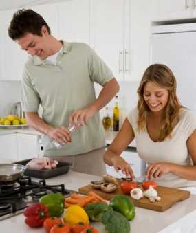 Photo: Couple cooking