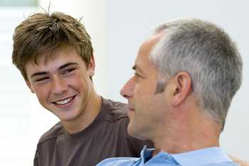 Male Caucasian Teen with Father