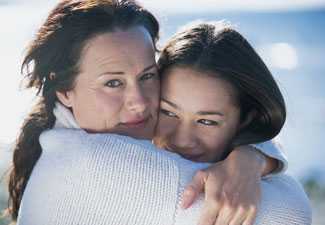 	Latina mother and daughter hugging