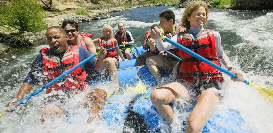 Images of people white water rafting. 