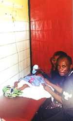 Infant recieving malaria drugs intravenously