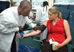 An image of a woman giving blood.