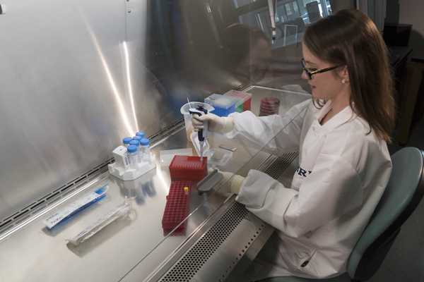 CDC Scientist Jessica Pryor working in the lab.