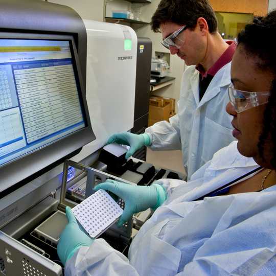 CDC scientists in the Legionella laboratory prepare equipment to perform whole genome sequencing of L. pneumophila isolated from environmental samples.