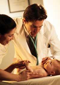 Doctor and Parent with a baby