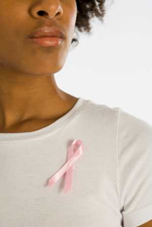 Photo: woman with a pink ribbon
